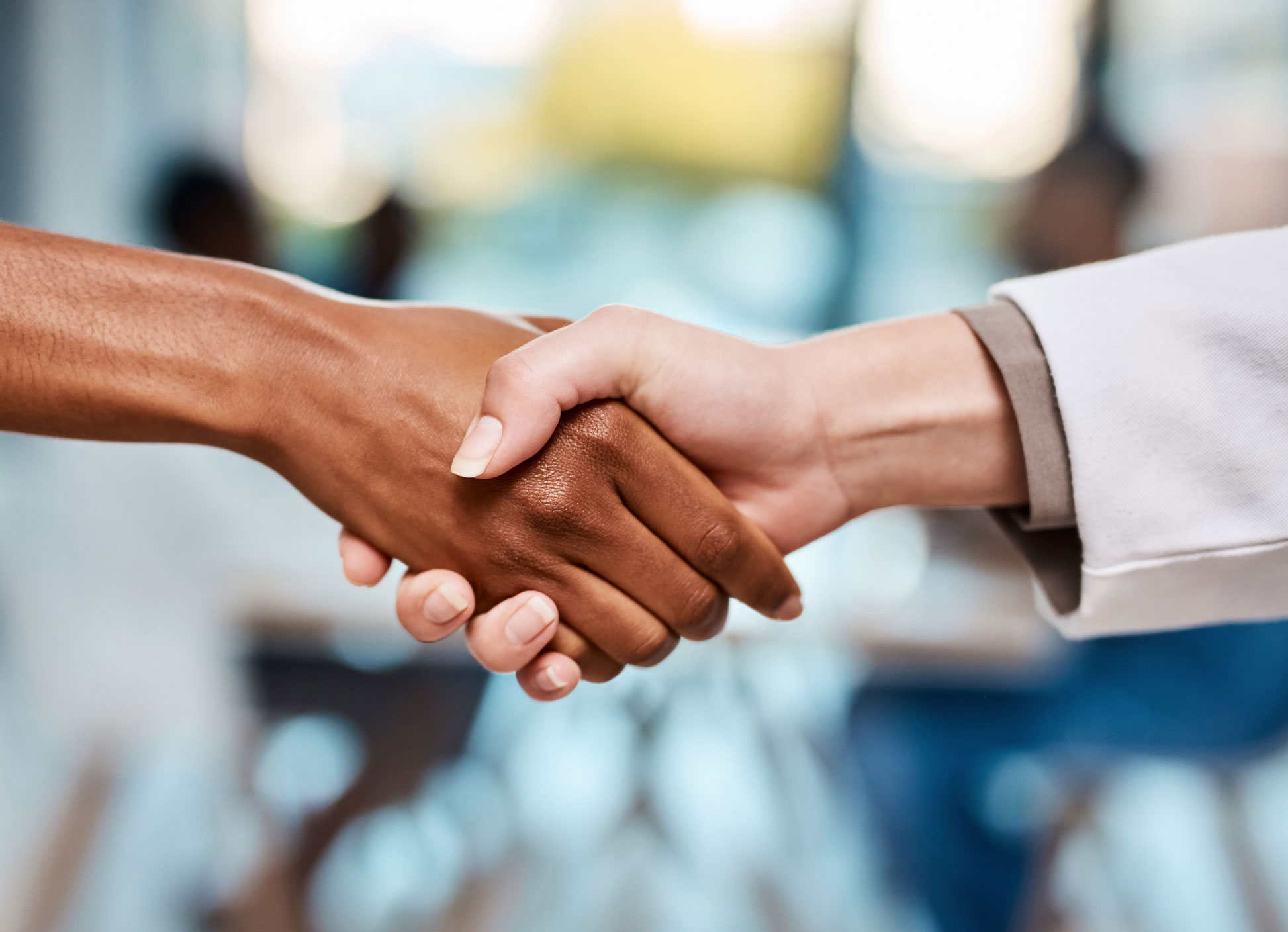 Patient and doctor shaking hands