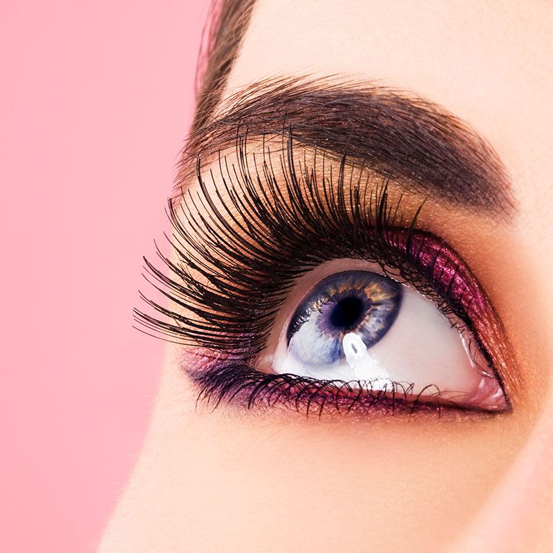 closeup of woman's eye with long eyelashes