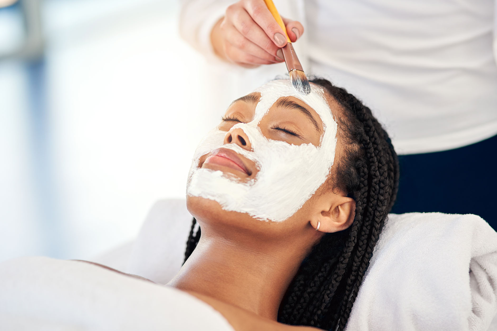 woman receiving chemical peel