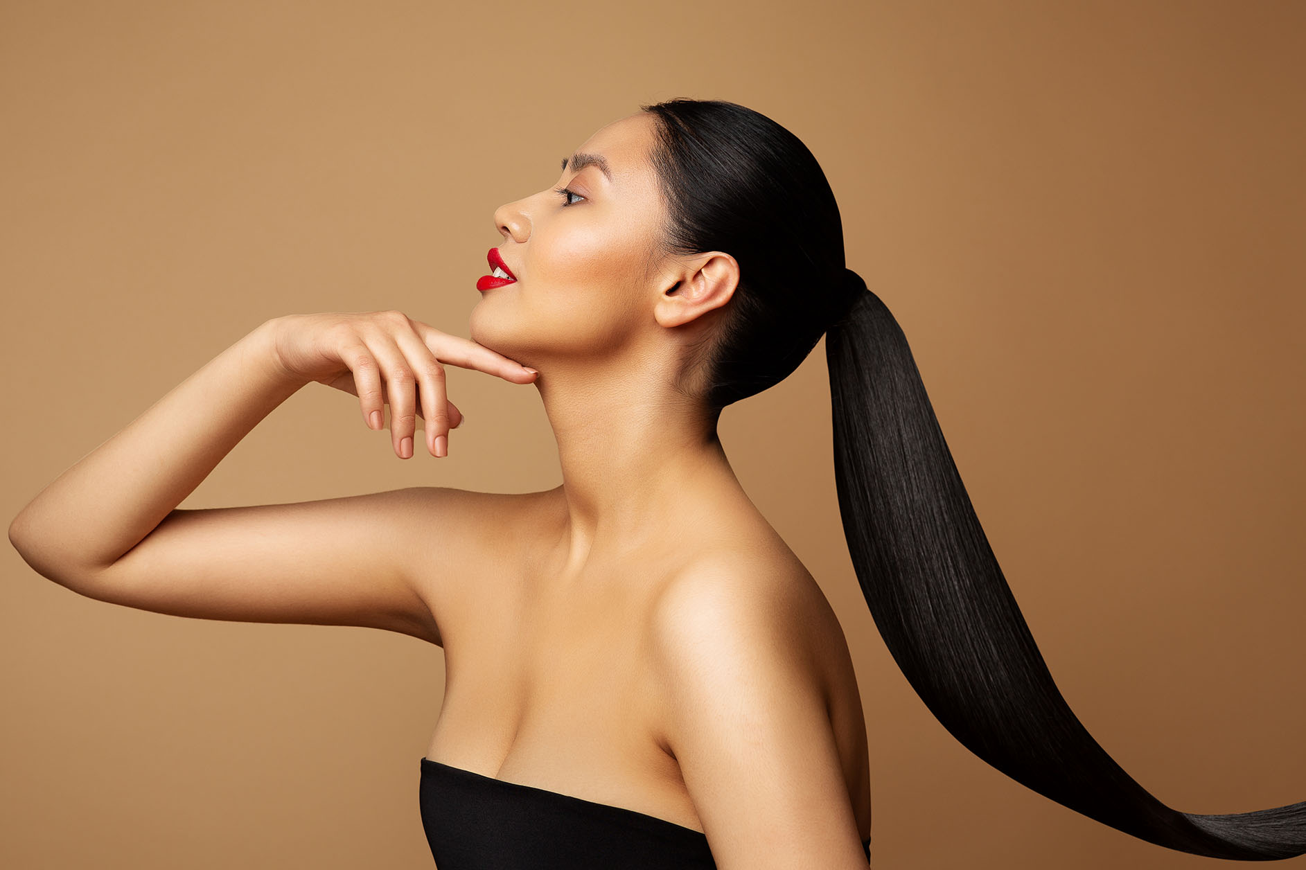 Young Woman with long Ponytail Hair